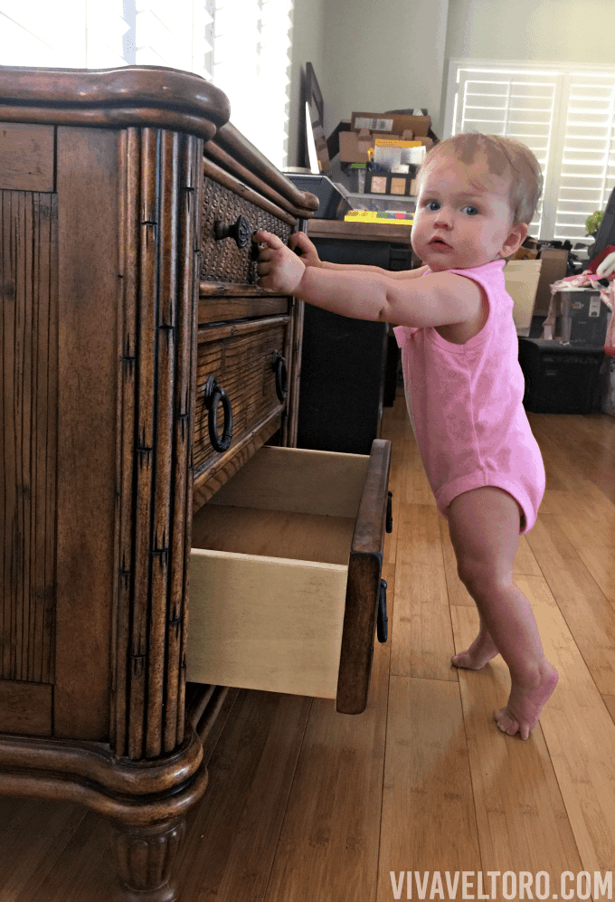 baby with dresser